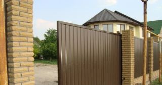 Купить откатные ворота из профнастила Усолье-Сибирское, цена от 1762 руб.